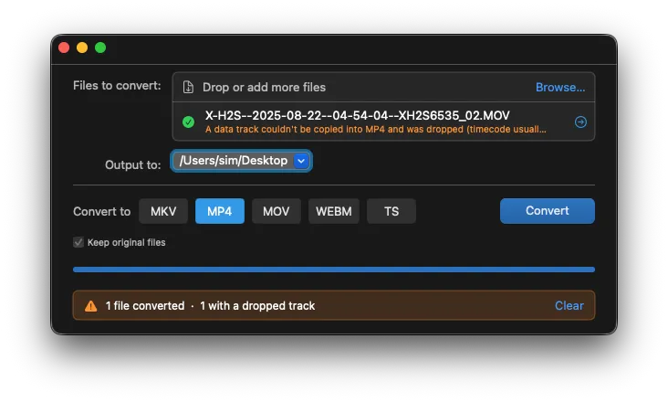 VideoContainerSwitcher after conversion — one file converted, one flagged with a dropped data track